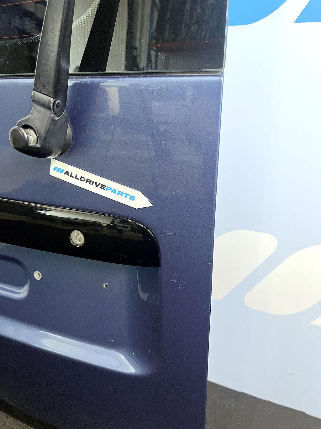 Achterdeur links VW Caddy met ruit blauw LR5T 2K0827091J